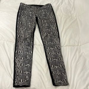 Micheal Kors half snake skin print half black skinny jeans. Very good condition